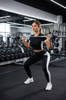 Model working out in gym wearing breathable butt-lifting yoga fitness outfit